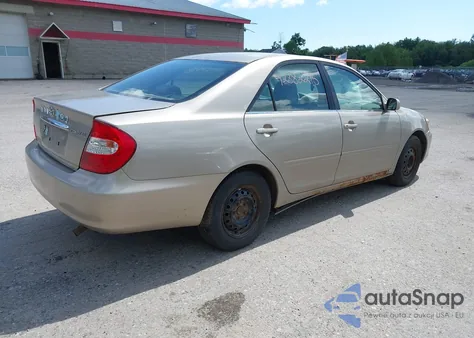2003 Toyota Camry Le z USA, uszkodzony, nr VIN 4T1BE32K03U735936